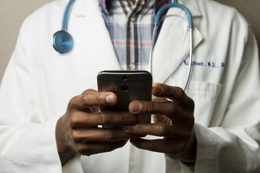 Doctor using a phone to manage procurement